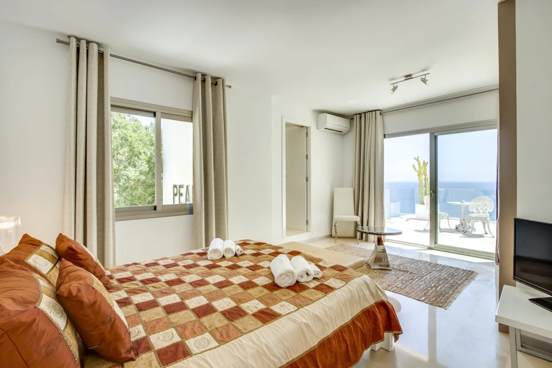 1681216636-Luxury real estates Ibiza to rent villa Raya Bedroom 2 .webp